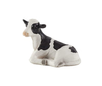 
              Holstein Calf Lying Down Farm Animal Figurine
            