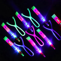 
              10/20/50pcs Amazing Light Toy Arrow Rocket Helicopter Flying Toy LED Light Toys Party Fun Gift Rubber Band Catapult
            